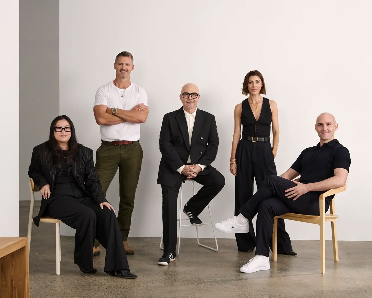 The publishing team gathered for a studio portrait
