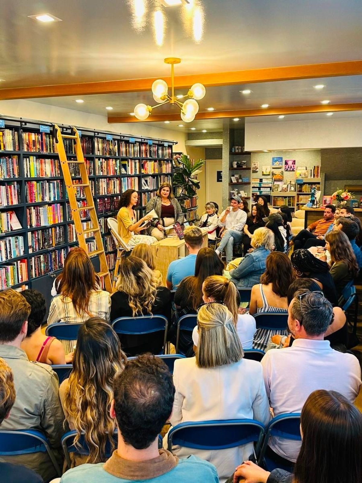 Readers attending a live bookstore event representing book marketing